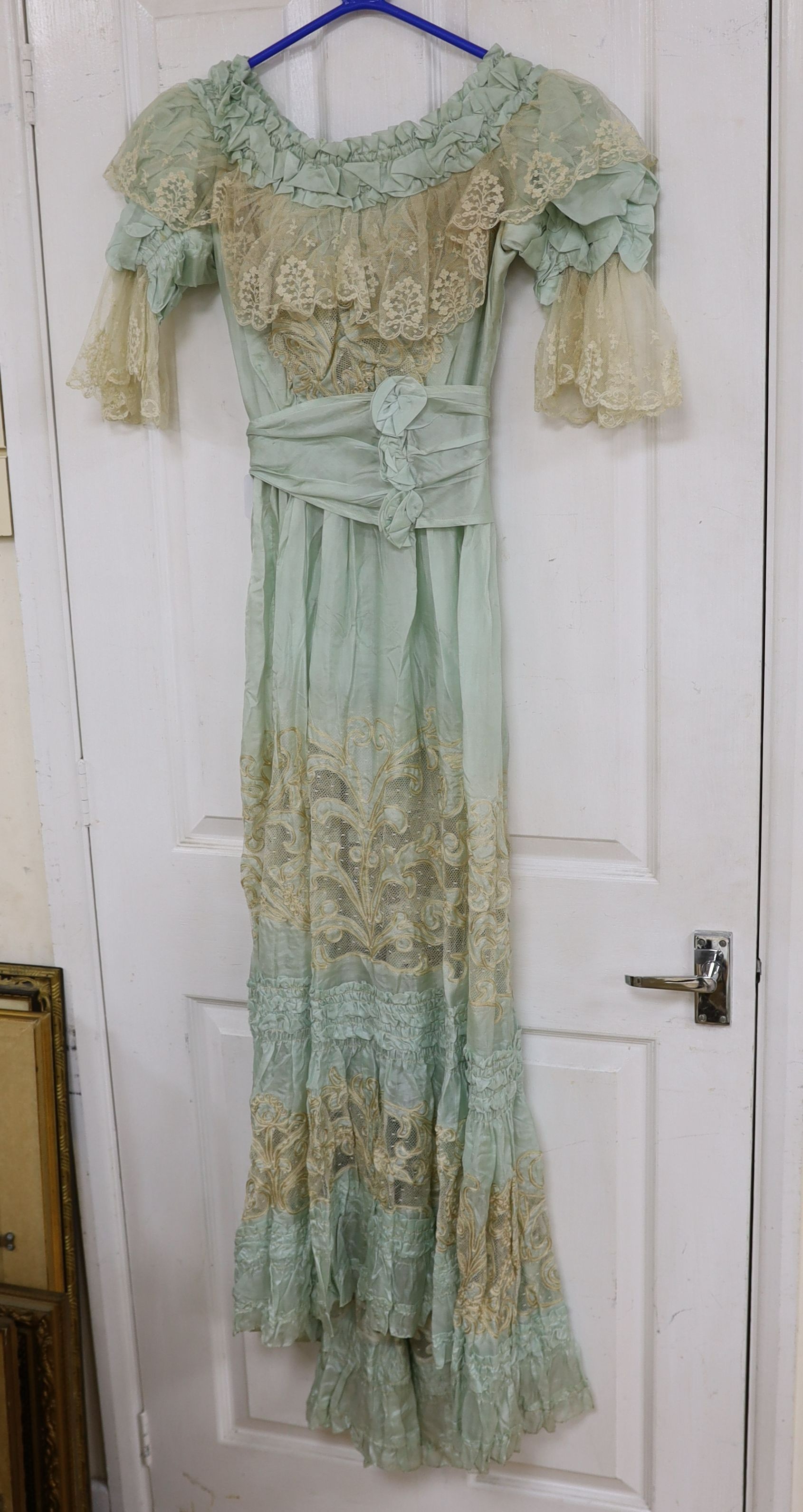 An Edwardian fine turquoise silk and ecru embroidered and lace ladies dress